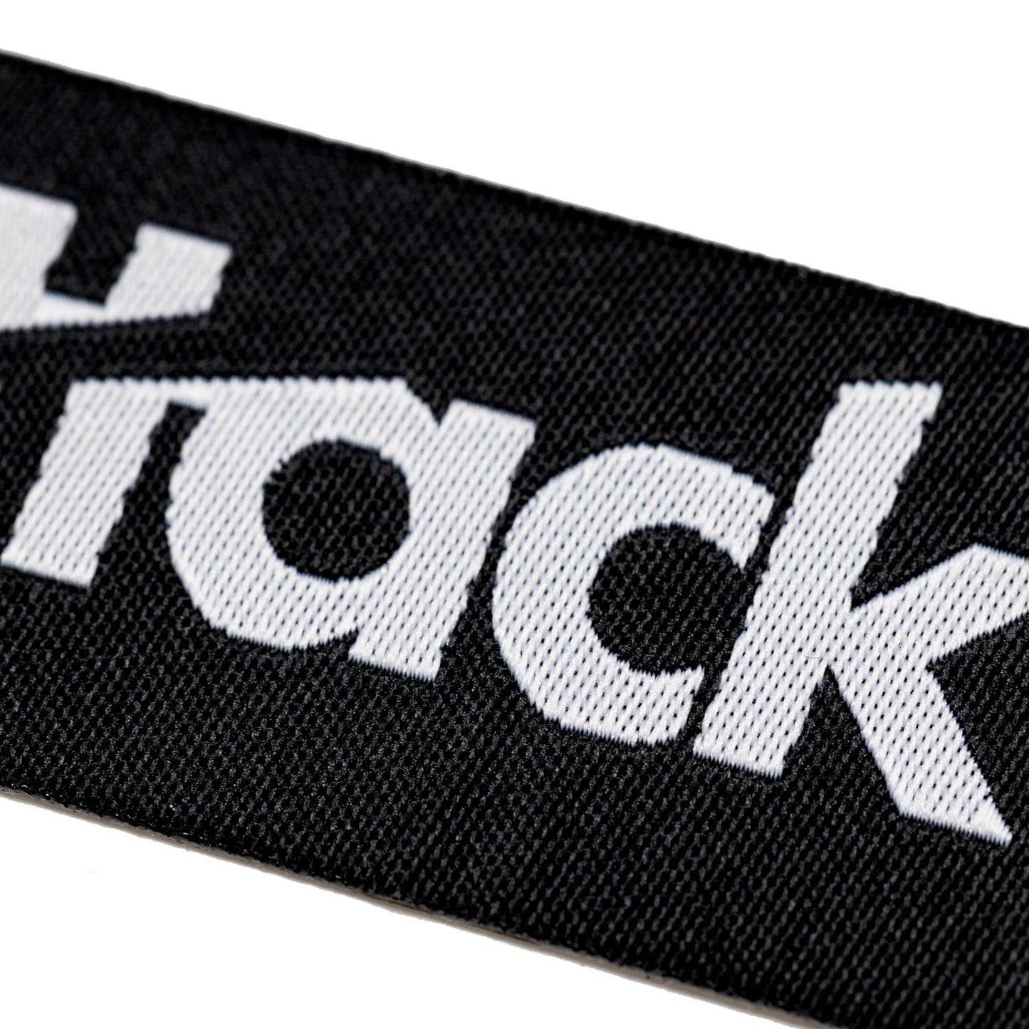 5" x 1" Black Woven Logo Sticker